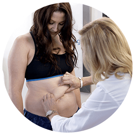 A person having her tummy checked