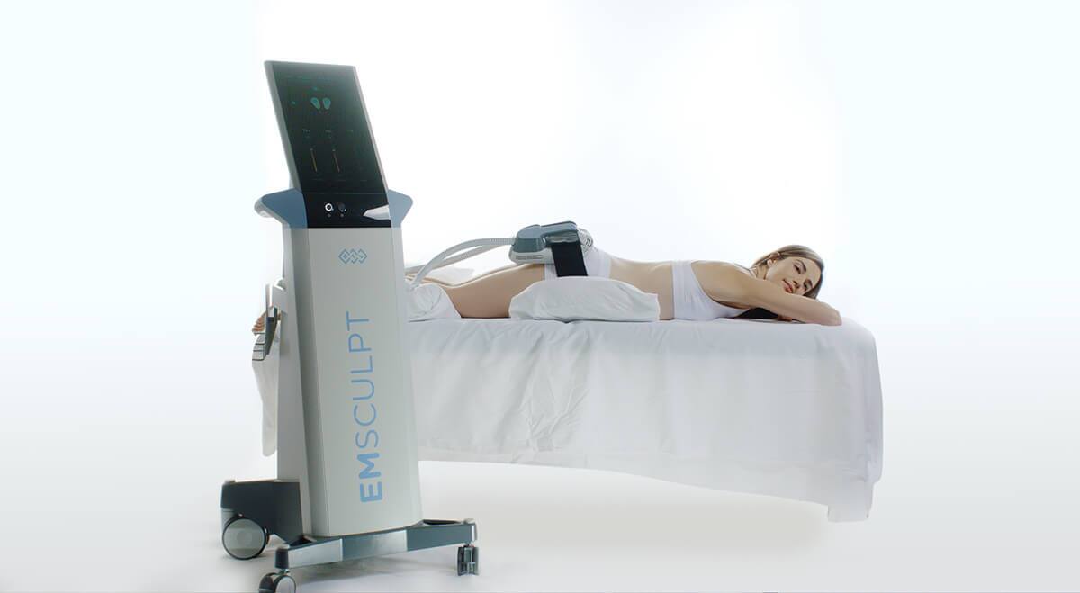 a person recieving emsculpt treatment